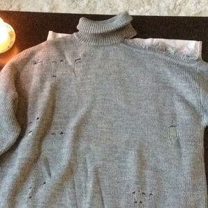 Turtle neck cold shoulder on the left side